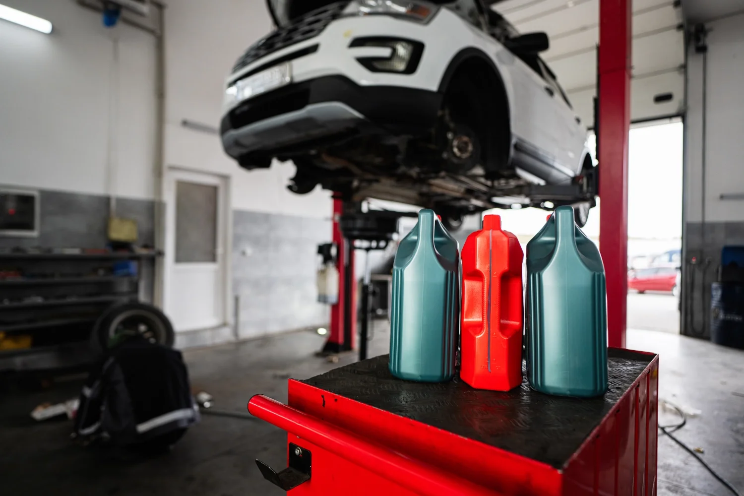 Technician installing a genuine Mopar oil filter